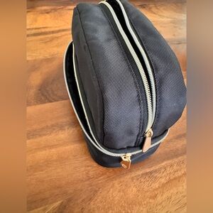 DOUBLE - PART COSMETIC TRAVEL POUCH - double zipped compartments.